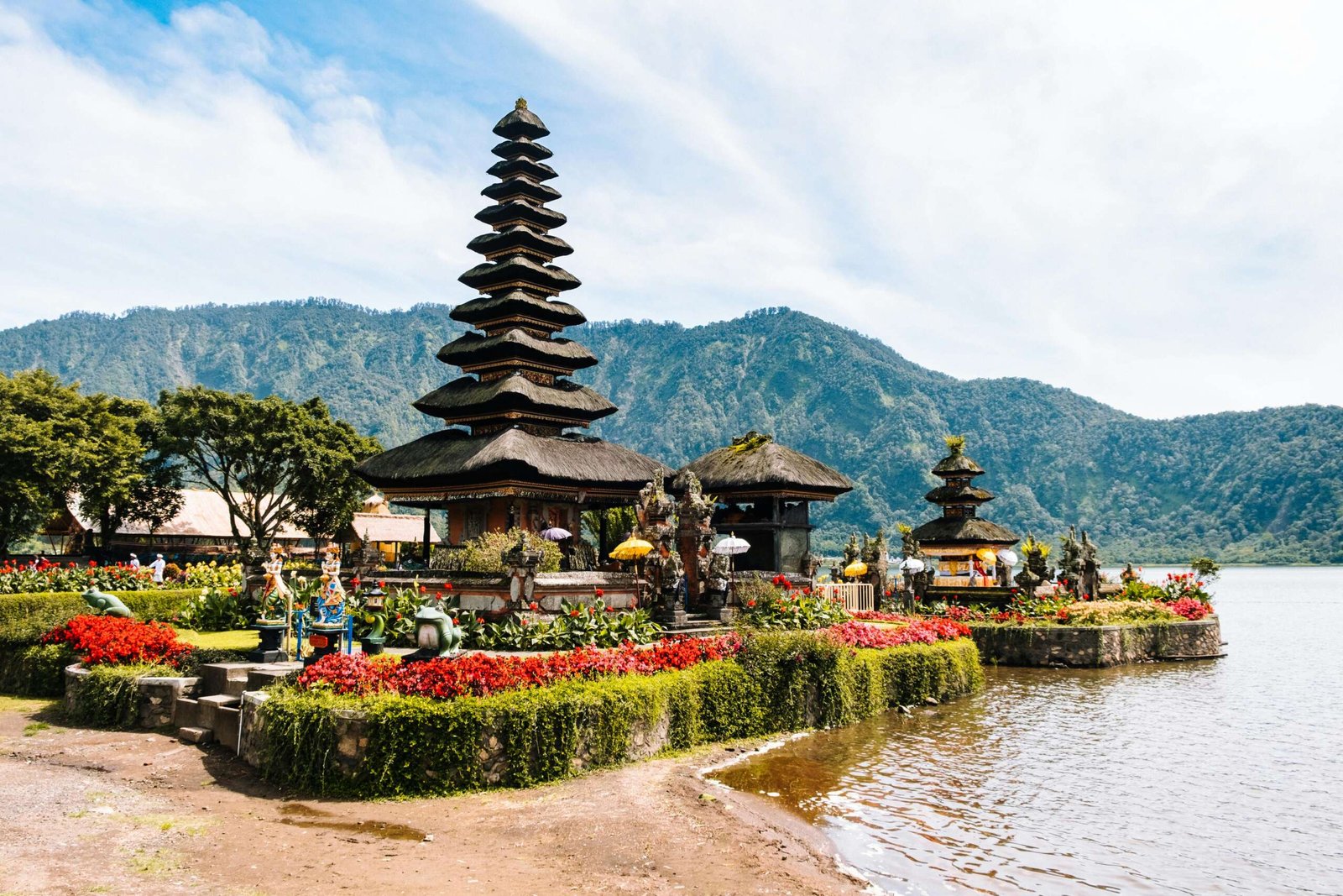 Captivating view of Ulun Danu Beratan Temple in Bali set against lush mountains.