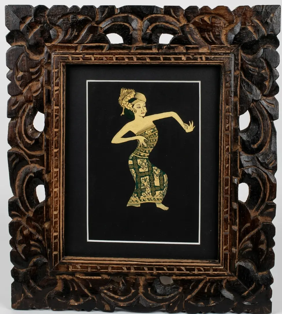 A custom framed Balinese traditional painting displayed as a sacred family heirloom artifact