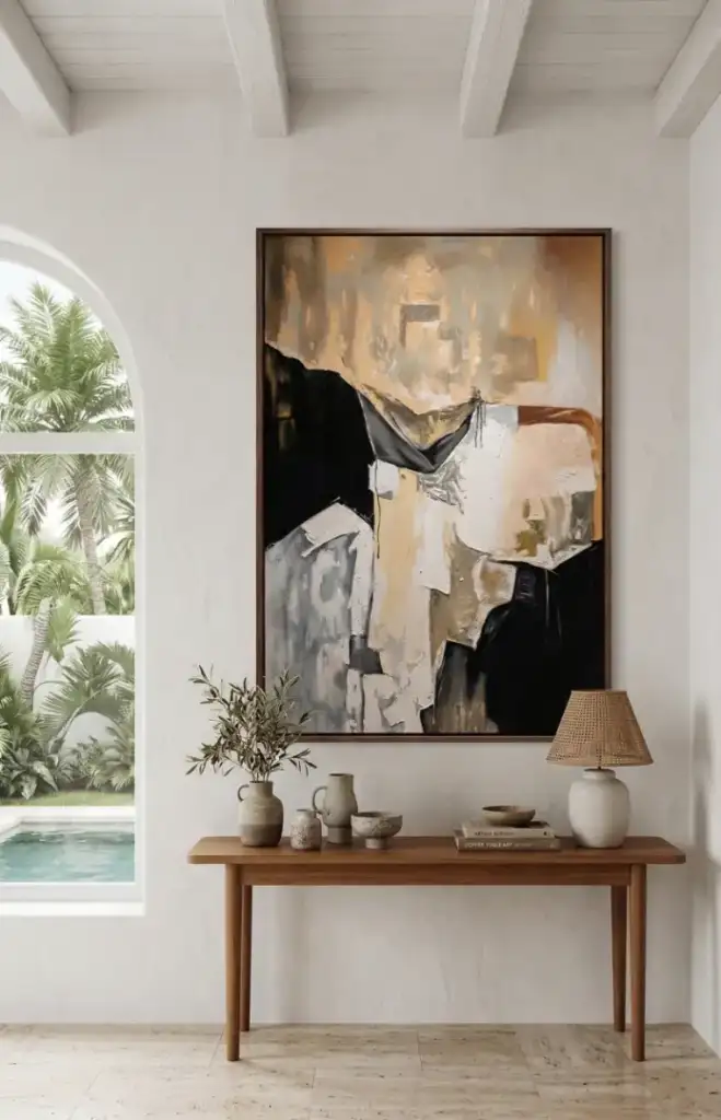 A finished custom abstract painting commission from Arts of Bali hanging prominently in a luxury Bali villa living room interior design