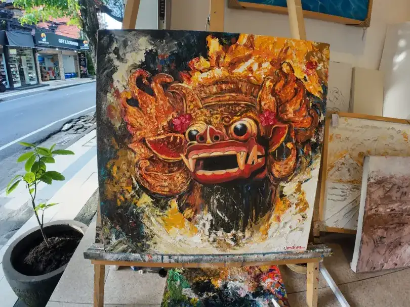 Barong palette knife painting on easel at Arts of Bali gallery Seminyak Kuta