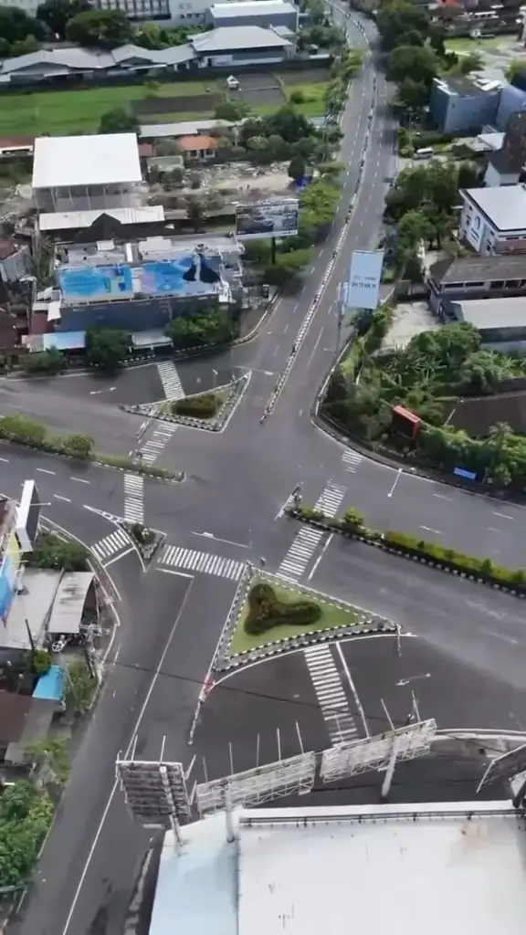 From the Noise to the Silence: Nyepi with the Arts of Bali Family - Arts of Bali Bird's eye view of completely empty road intersections in Denpasar, Bali during Nyepi, the Balinese Day of Silence