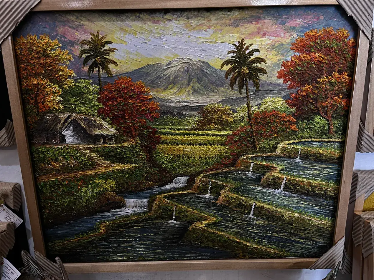 Bali rice field landscape painting in oil on canvas showing layered green terraces with reflective water channels at Arts of Bali Seminyak gallery