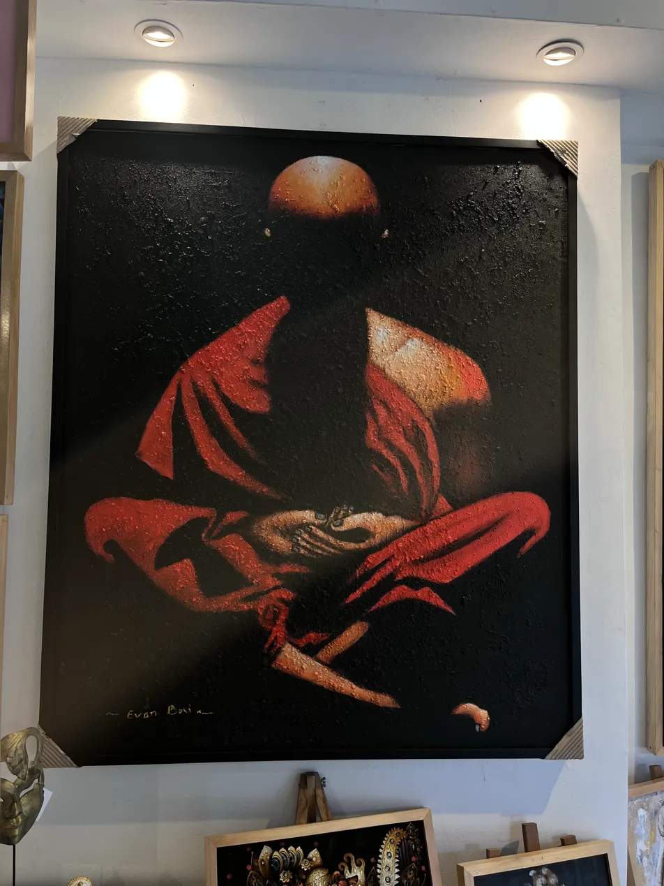 Textured Painting Bali — Meditating Monk by Evan Bali Large textured painting Bali of meditating monk in red robe seen from behind on black background