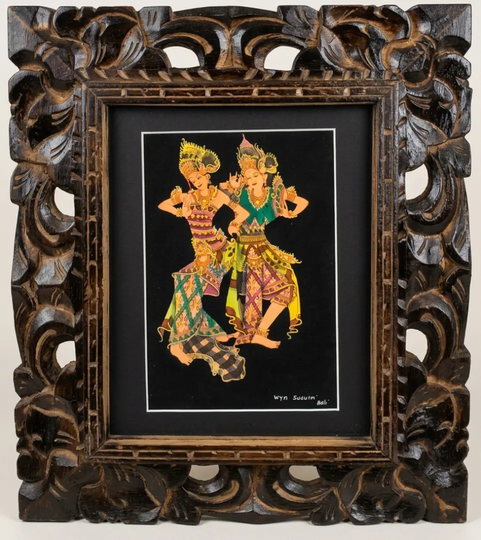 Traditional Balinese Legong dancer painting by Wyn Suduim on black background in hand carved Balinese wood frame