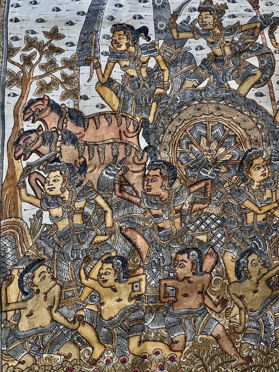 Balinese mythology painting close-up — battle scene with chariot wheel figures in traditional Kamasan Batuan style showing intricate line work and figure rendering in earth tones