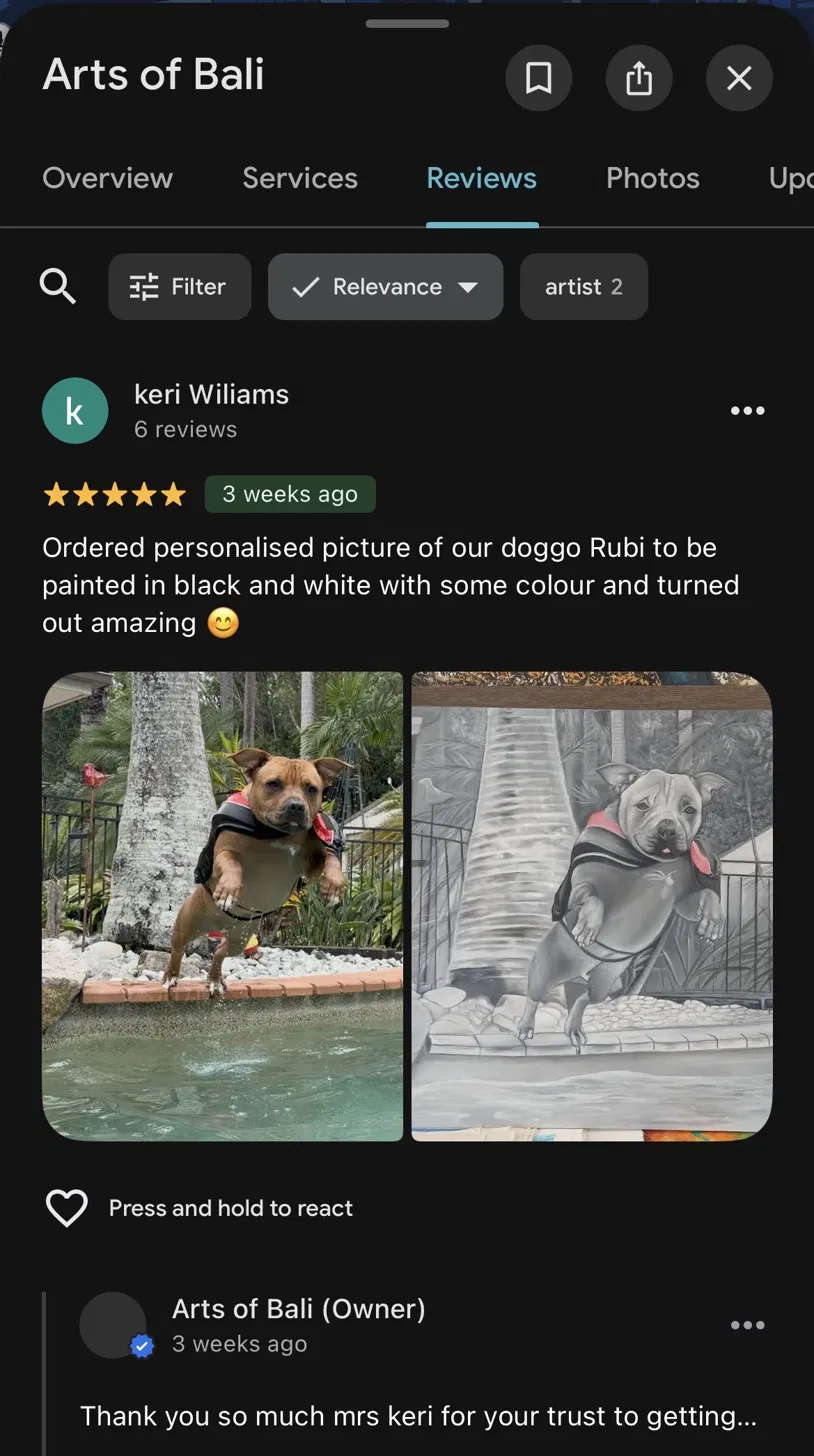 Real Client Review: From Reference Photo to Finished Custom Painting Google review from client Keri Williams showing her dog Rubi's original reference photo next to the completed black-and-white custom painting by Arts of Bali