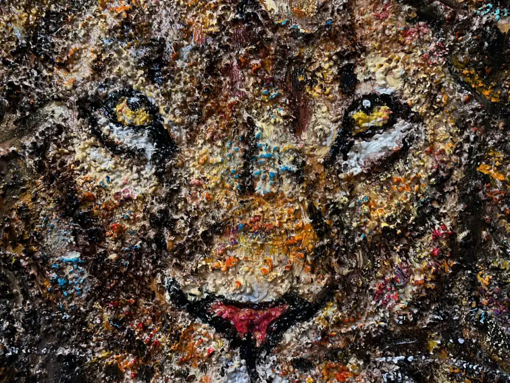 Best wildlife painting Bali showing textured lion sand art at Arts of Bali gallery