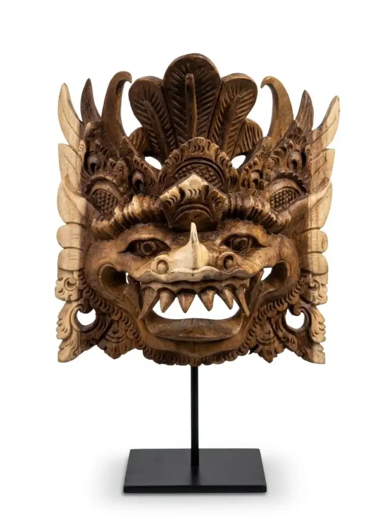 Fierce Balinese guardian mask with prominent tusks, hand-carved in Bali hardwood, available at Arts of Bali gallery Seminyak