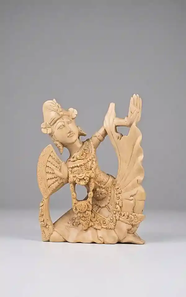 Premium Balinese Kebyar Duduk sculpture — hand-carved seated dancer in local hardwood, Arts of Bali gallery Seminyak
