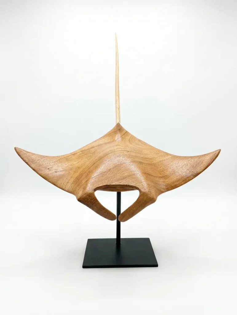 Hand-carved manta ray wooden sculpture 40cm on a display stand, authentic Indonesian wood carving from Arts of Bali.