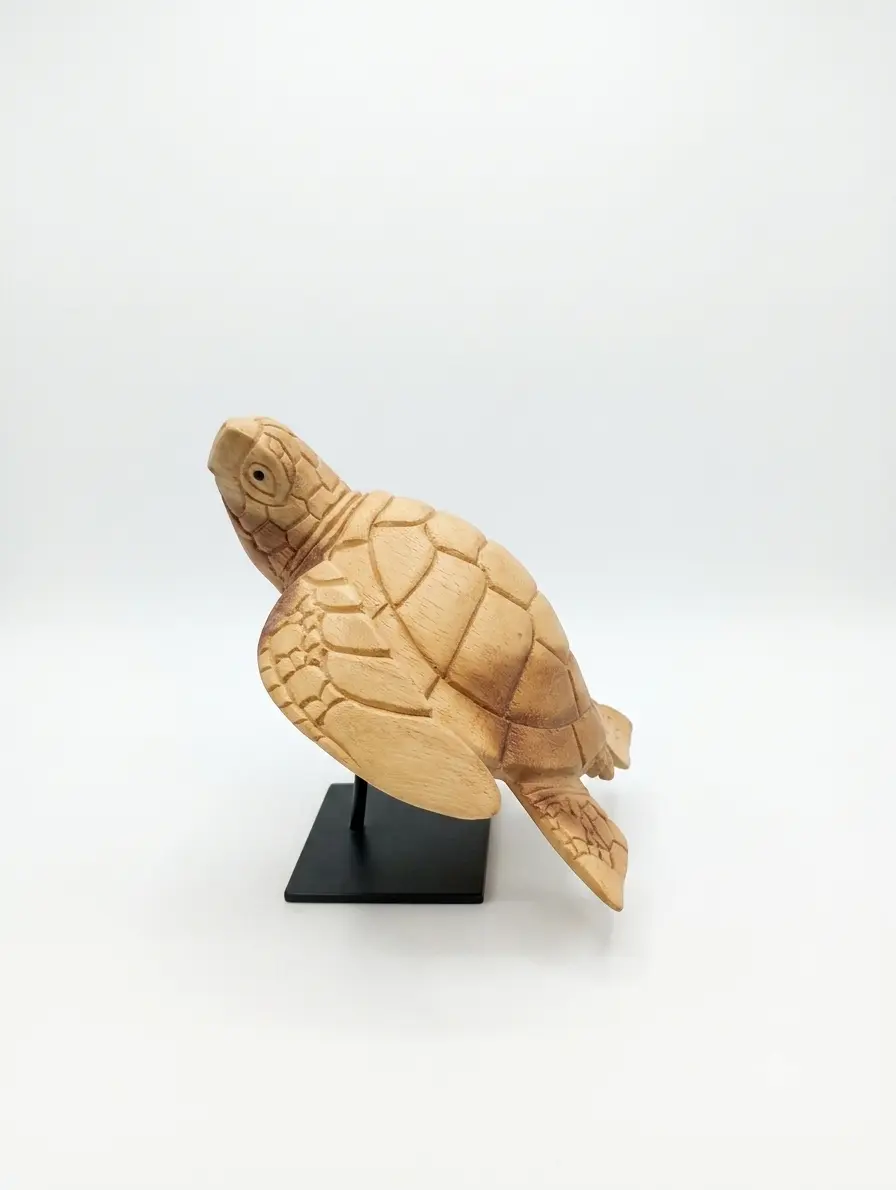 Sea Turtle Wooden Sculpture (20 cm) - Arts of Bali Hand-carved sea turtle wooden sculpture 20cm mounted on a black stand, handcrafted Indonesian wood carving from Arts of Bali.