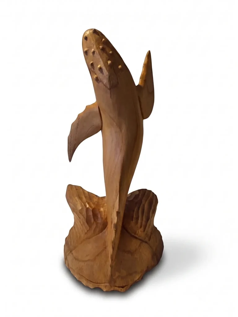 Hand-carved wooden humpback whale sculpture breaching over ocean waves, Indonesian decorative art Arts of Bali Seminyak