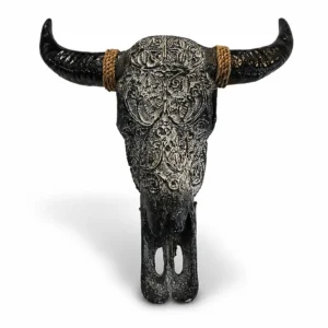 Hand-crafted tribal bull skull metal wall sculpture with detailed carvings and horns, Indonesian decorative art Arts of Bali Seminyak