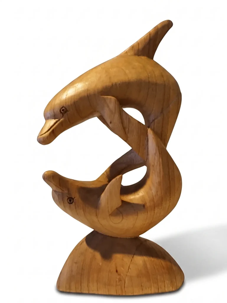 Handcrafted wooden double dolphin sculpture showing two leaping dolphins, Indonesian decorative art Arts of Bali Seminyak