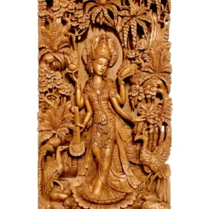 Traditional Balinese wood carving panel depicting goddess Saraswati with her musical instrument and swan in a detailed jungle setting arts of bali