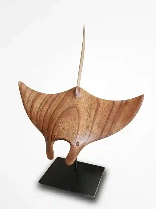Authentic handcrafted oceanic manta ray figurine in warm polished wood from Arts of Bali.