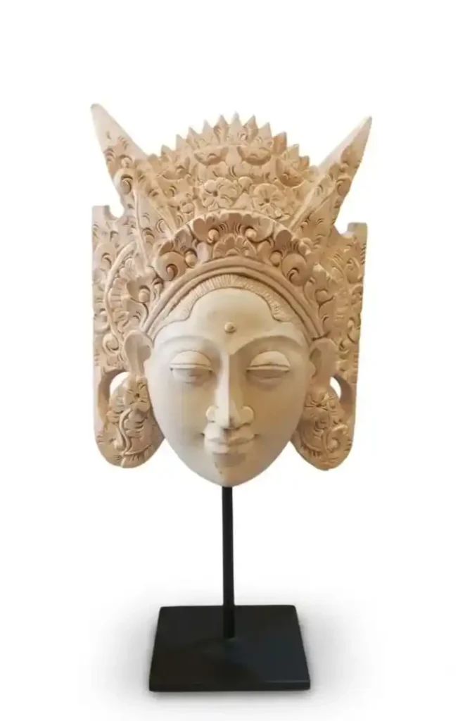 Hand-carved Balinese noble deity bust wearing traditional pointed crown on black stand from Arts of Bali.